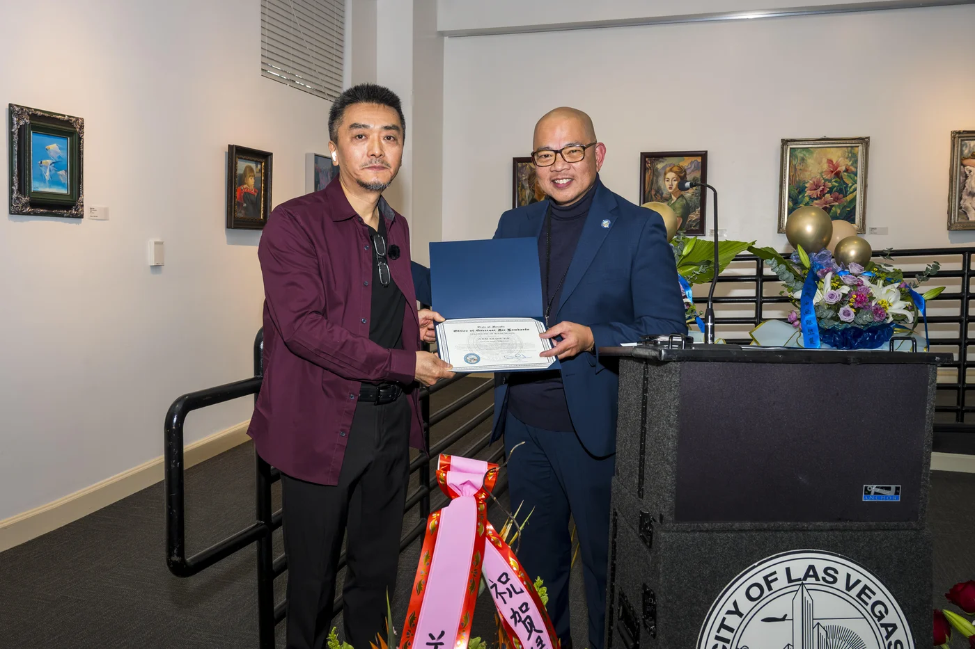 Receiving the Certificate of Recognition at the Song of the Oasis opening